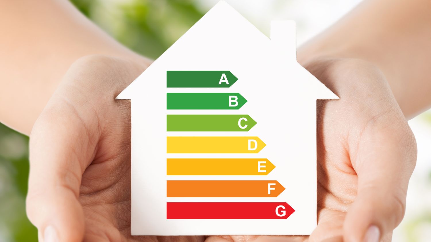 Energy Saving Real Estate Family Home Concept Closeup Female Hands Holding White Paper House With Energy Efficiency Rating